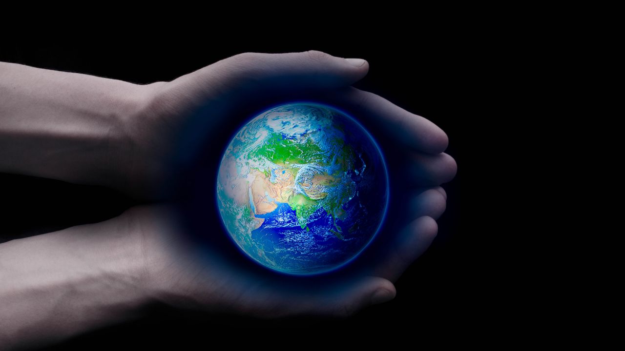 Planet Earth Holding hands